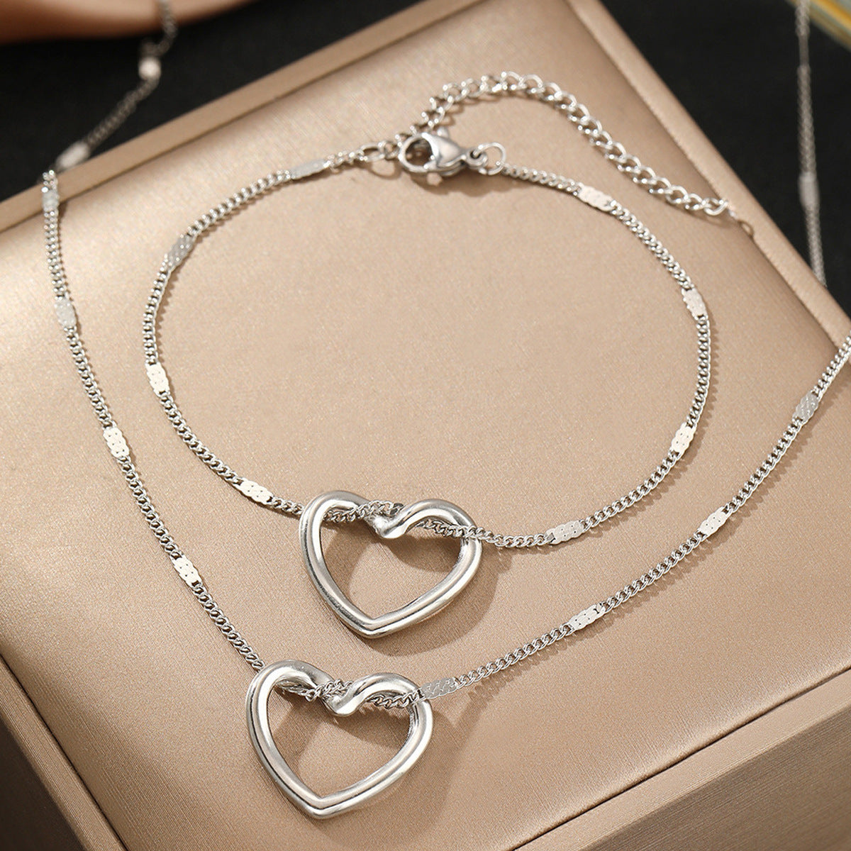 Stainless Steel Hollow Heart Necklace And Bracelet Set
