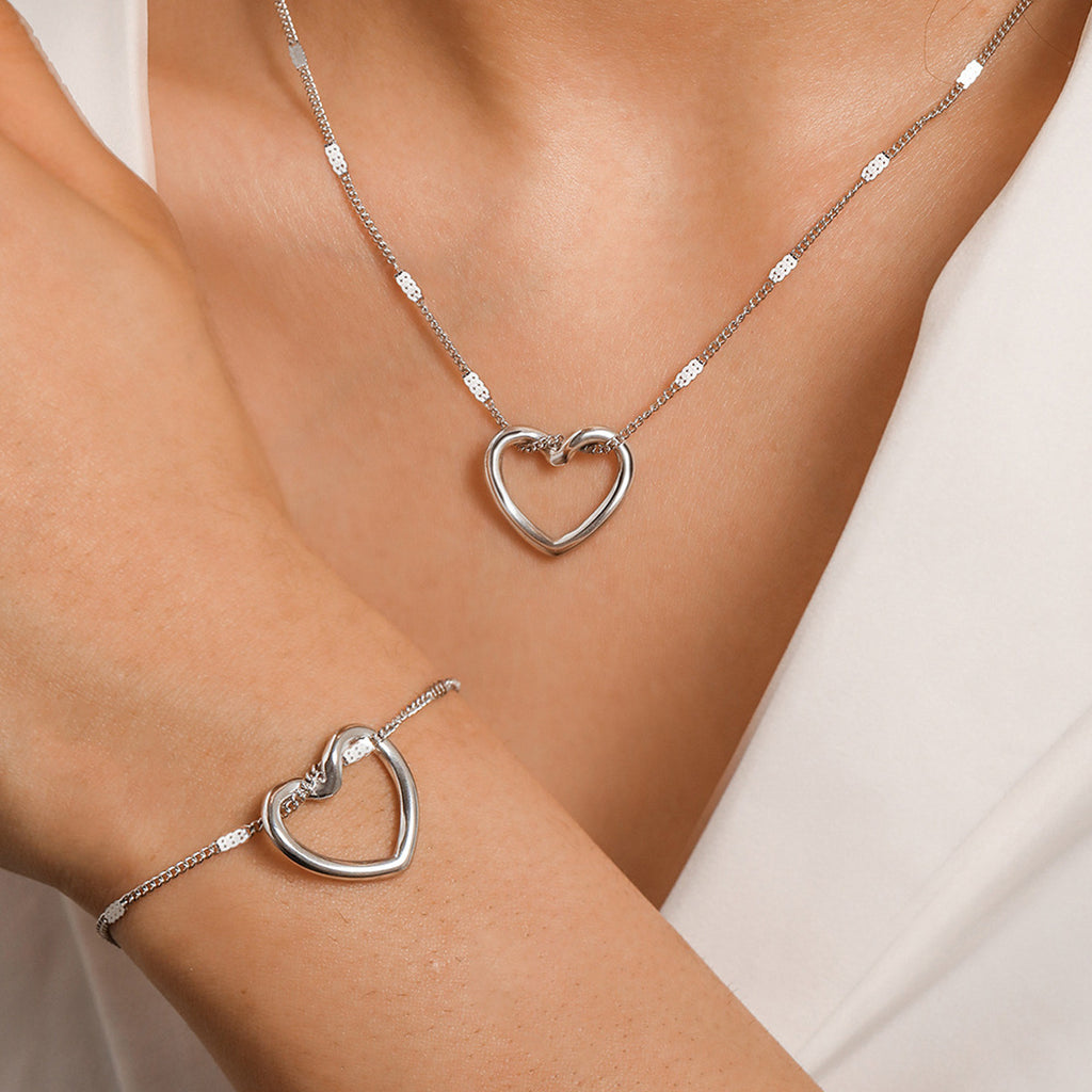 Stainless Steel Hollow Heart Necklace And Bracelet Set